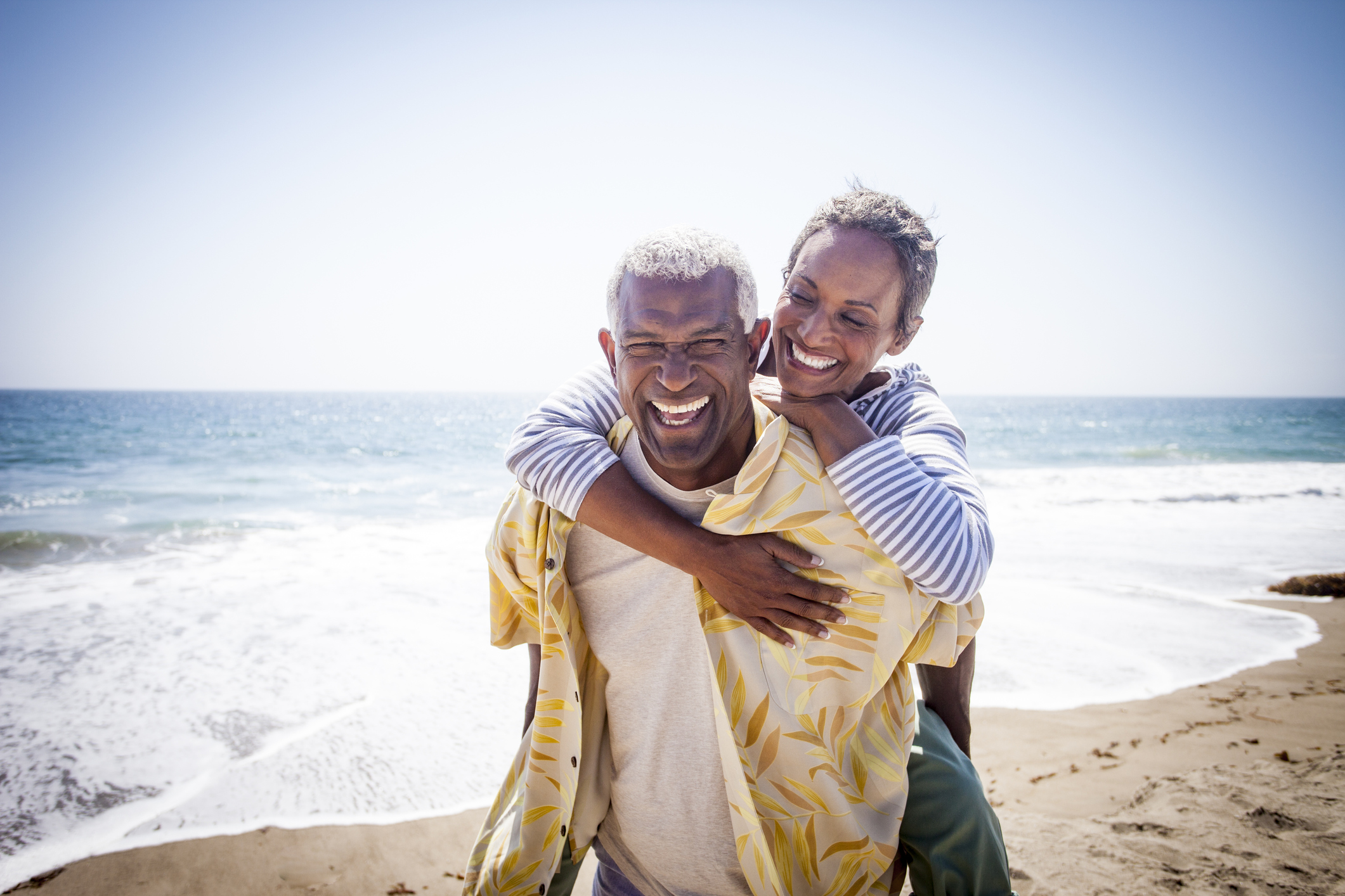 Black Couple Piggyback On Beach Florida Lung Asth